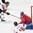 PARIS, FRANCE - MAY 7: Switzerland's Cody Almond #89 scores on Norway's Henrik Haukeland #33 while his teammate Reto Schappi #19 looks on during preliminary round action at the 2017 IIHF Ice Hockey World Championship. (Photo by Matt Zambonin/HHOF-IIHF Images)